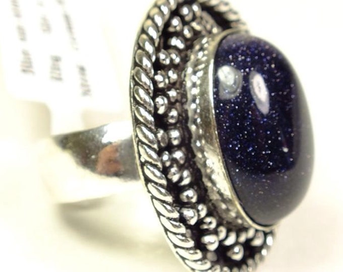 Storewide 25% Off SALE Vintage Bold and beautiful Stunning Blue Sun Stone cocktail ring Featuring oval center cabochon set in white metal