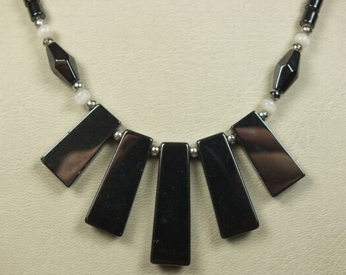 Storewide 25% Off SALE Beautiful black hematite pendant necklace with a Silvertone barrel clasp featuring retro style throughout
