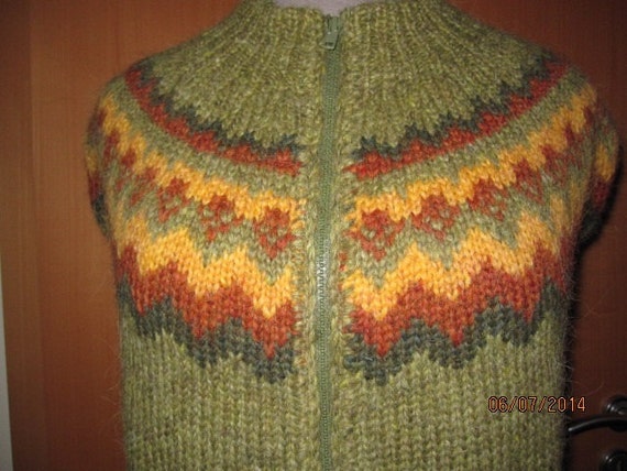 Green traditional Icelandic sweater Lopapeysa by Baldursheimur