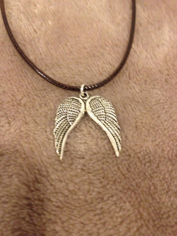 Items similar to Brown corded, Angel Wings Pendant on Etsy