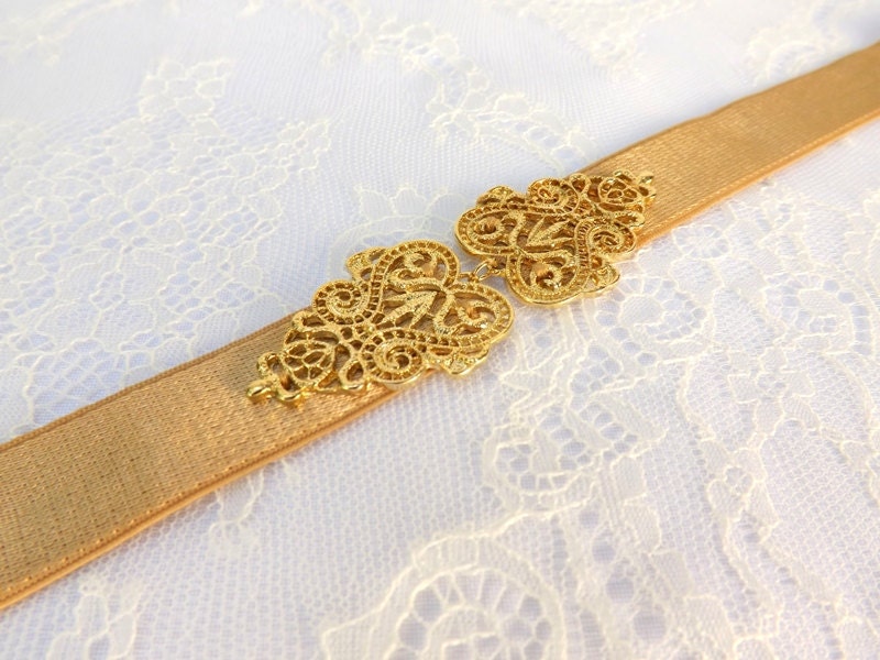 Gold Elastic waist belt. Gold vintage style filigree buckle.