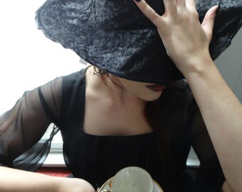 black hat from ahs coven