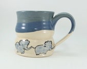 elephants on a cup