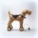 Little Lakeland Terrier on vintage Meccano wheels