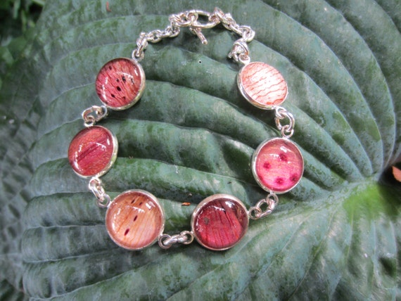 Pressed flower Cabochon Charm Bracelet. Real Lily/Tulip petals behind glass.