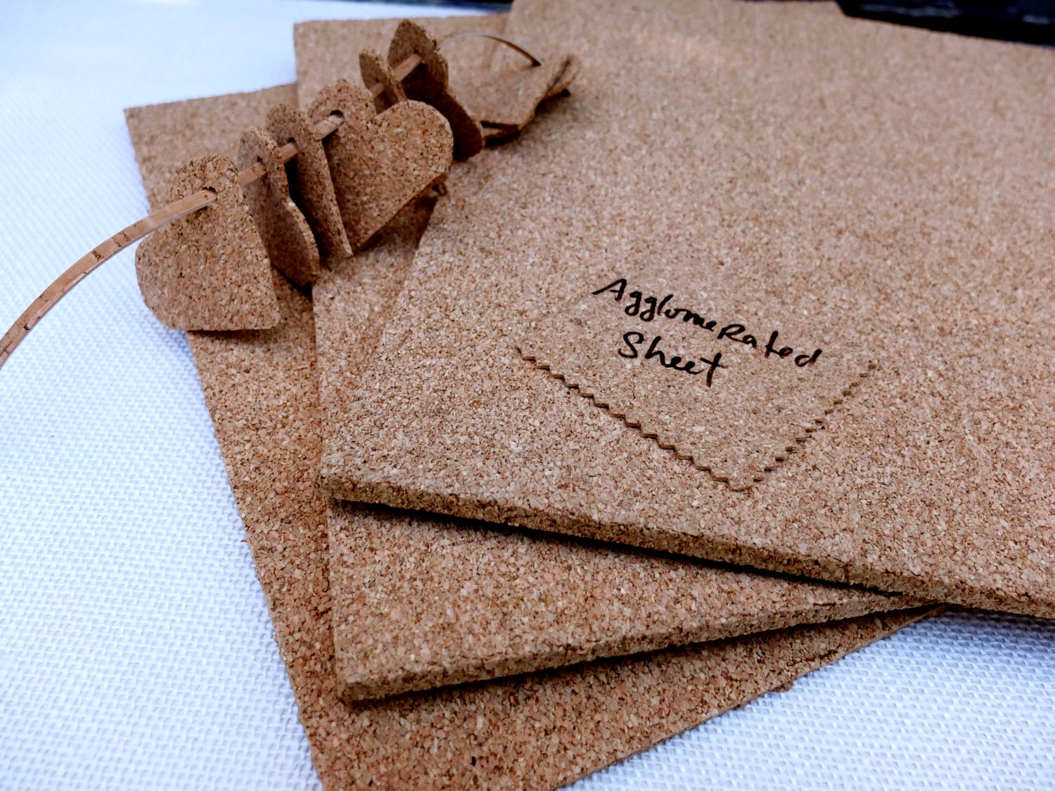 Thick agglomerated cork sheets three made from cork grains