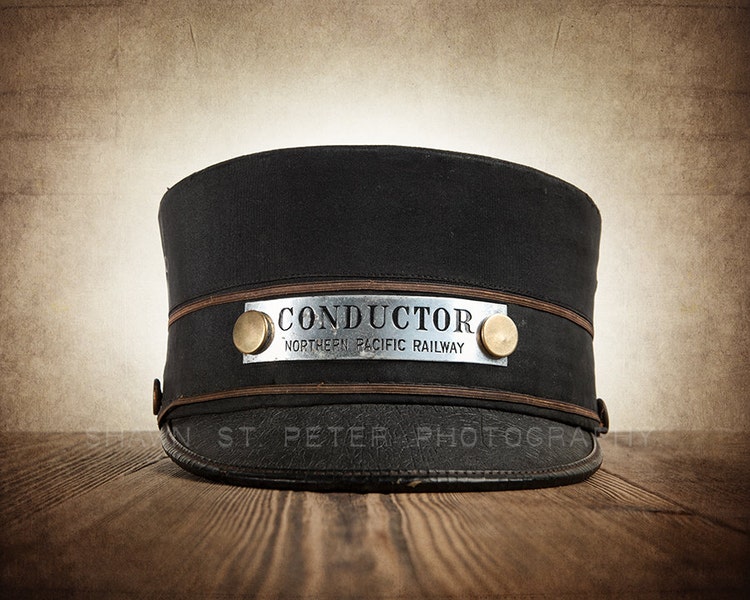Vintage Train Conductor Hat One Photo Print by shawnstpeter
