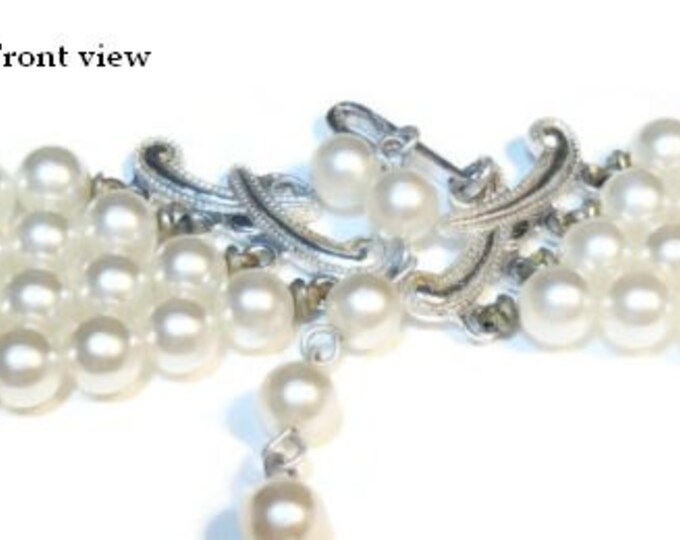 Stunning 4 strand milky white graduated pearl neckace marked Japan