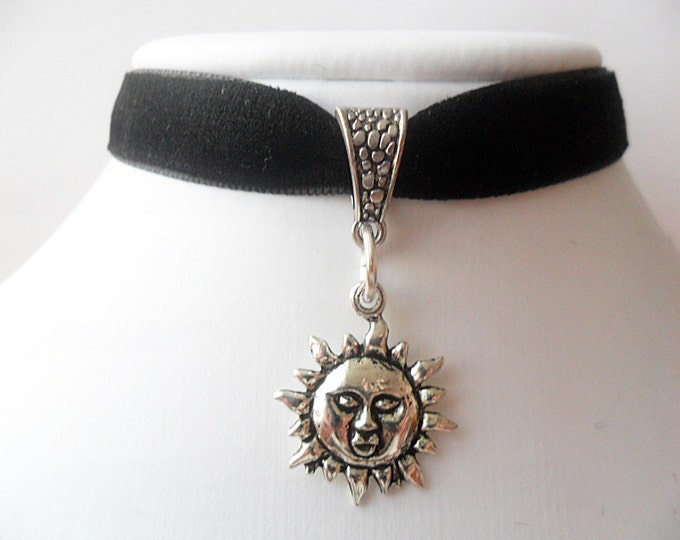 Velvet choker with silver tone sun flower pendant and a width of 3/8”Black, Leon, Mathilda, Natalie Portman Ribbon Choker Necklace