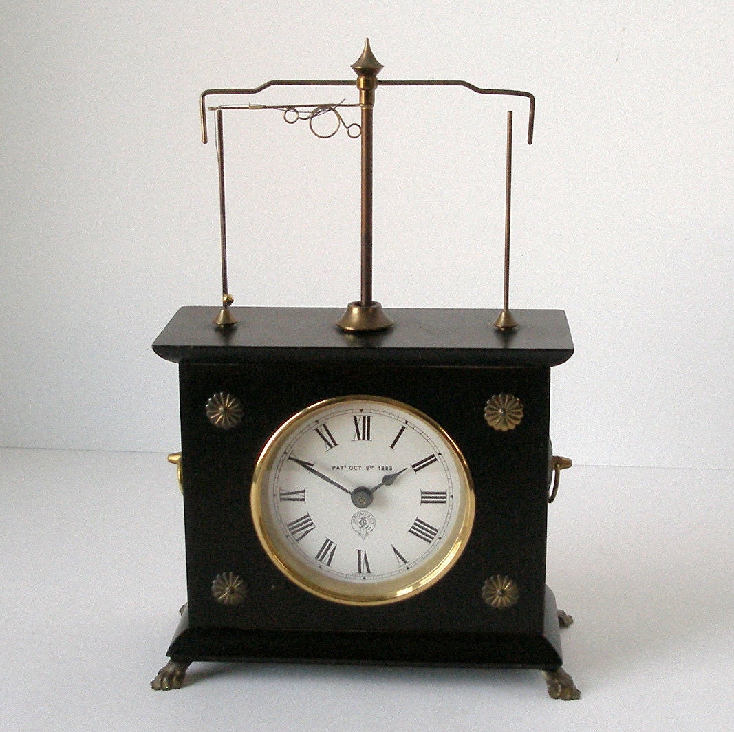 70s Horolovar Ignatz Flying Pendulum Clock Ebony Regency Style