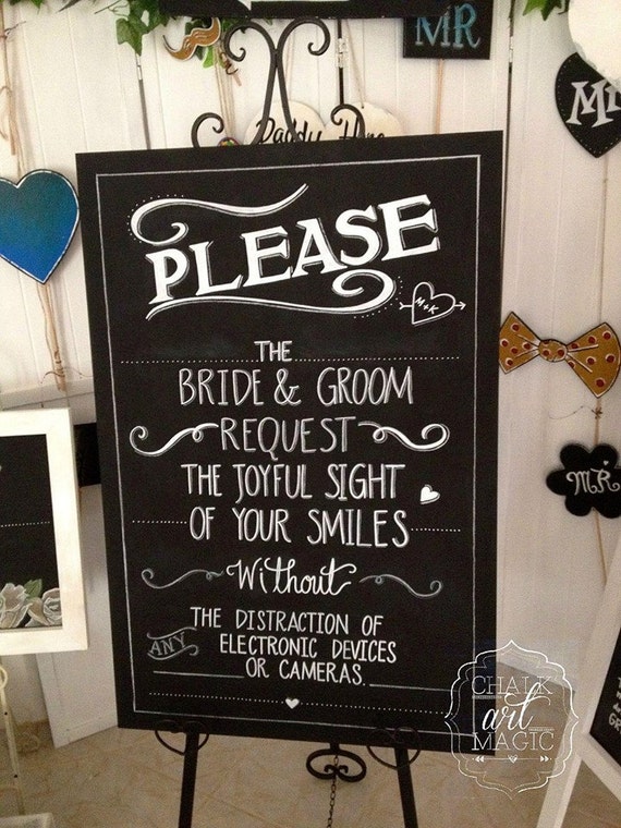 Items similar to No Photos wedding chalkboard sign. on Etsy