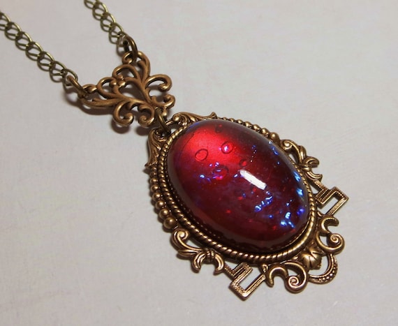 Items similar to Mexican Opal Dragons Breath Pendant Necklace Jewelry ...