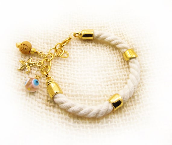 ... Bracelet Gold Tone Starfish Charm Bracelet Lava Bead Bracelet Evil eye