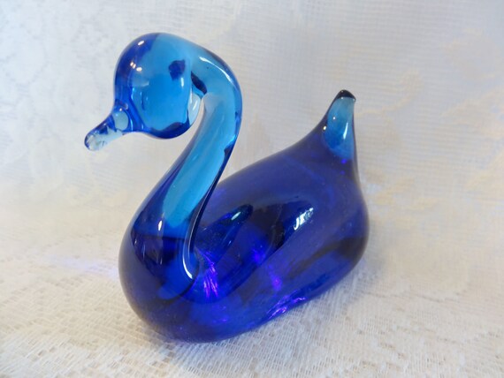 blue glass swan figurine