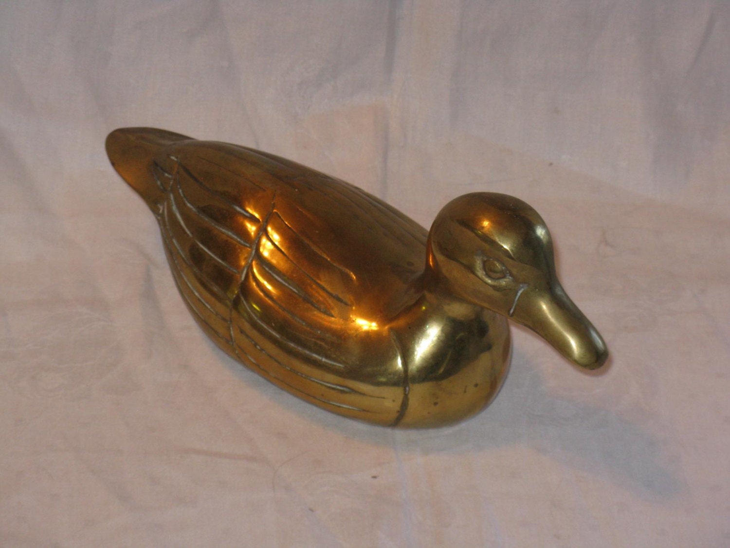 solid brass duck figurines