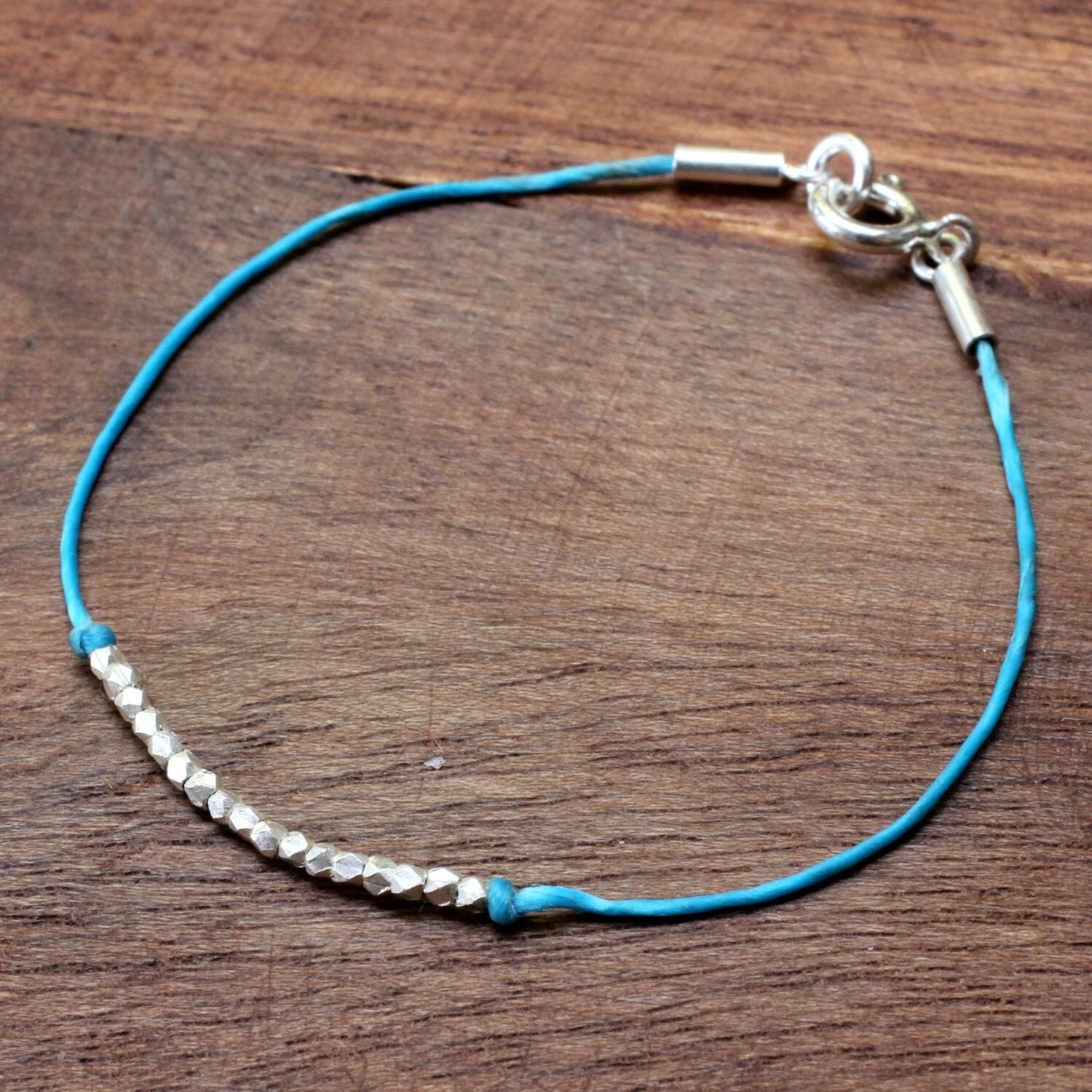 Waxed cotton bracelet with sterling silver beads