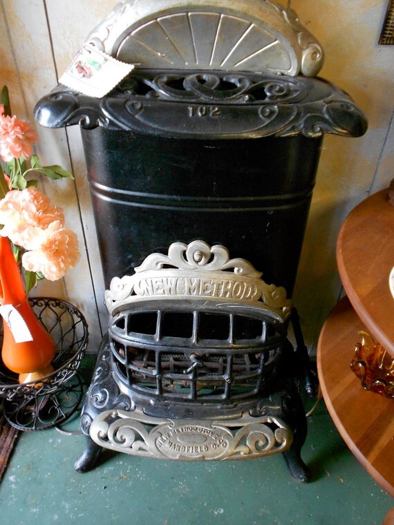 Items similar to 1900's Parlor Gas Stove Cast Iron Antique on Etsy