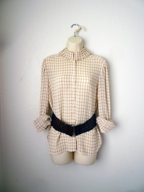 sheer cream blouse