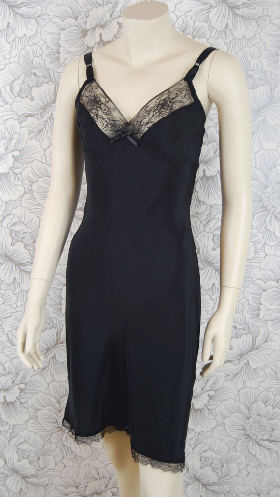 Items similar to A classic black silk slip trimmed with French lace on Etsy