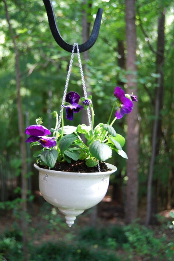 White Hanging Basket with a Decoration on the Bottom