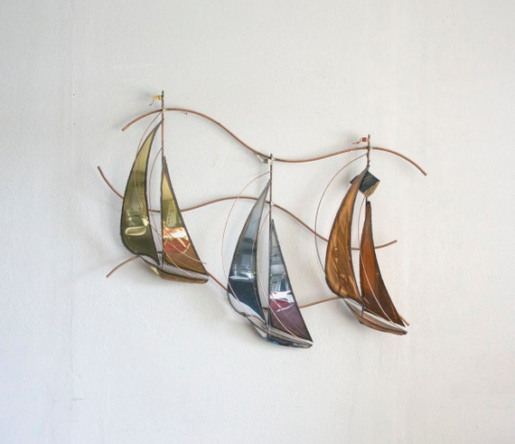 blue sailboat wall hanging