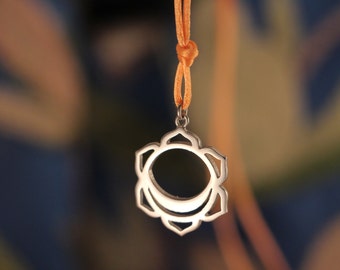 chakra necklace, chakra pendant, silver, with the svadhisthana chakra sex chakra and orange cord or chain.