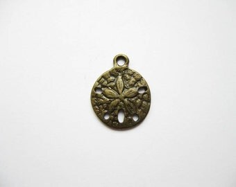 SALE - 10 Sand Dollar Charms in Bronze Tone - C1928