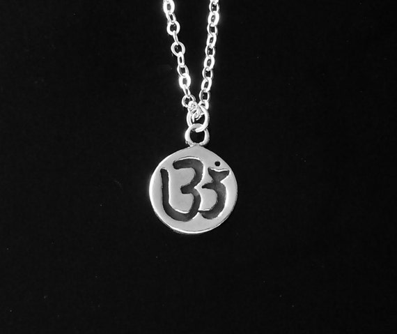 Items similar to Om Pendant Necklace in Gold or Silver on Etsy