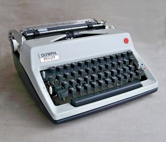 1970s Olympia DeLuxe Portable Typewriter with Rare Cursive