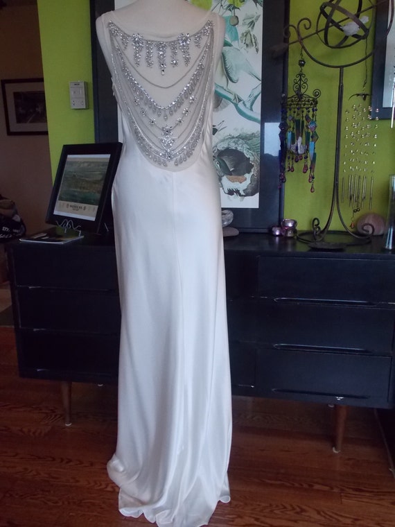 https://www.etsy.com/listing/193473629/wedding-dress-rhinestone-deco-dream?ref=sr_gallery_36&ga_search_query=1930s+wedding+gown&ga_ship_to=ZZ&ga_search_type=all&ga_view_type=gallery