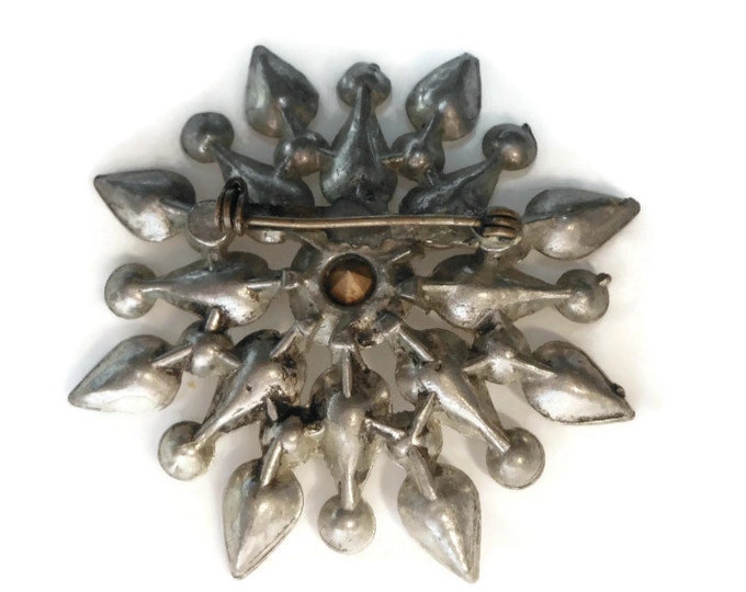 1930s rhinestone star burst brooch with faux marcasite in pot metal