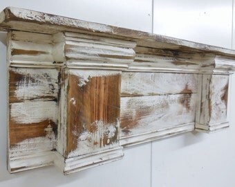 French Country Mantle Primitive Mantle Fireplace Mantel Hello and thank you for stopping by. Introducing my upscale French country mantle. This one has a ton of detail including an arched bottom. Wooden appliques add a very French charm. This mantle is done in my distressed white. This one starts at 24 inches