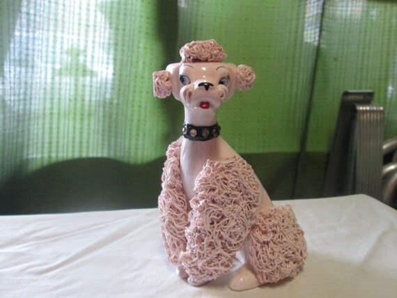 pink spaghetti poodle figurine