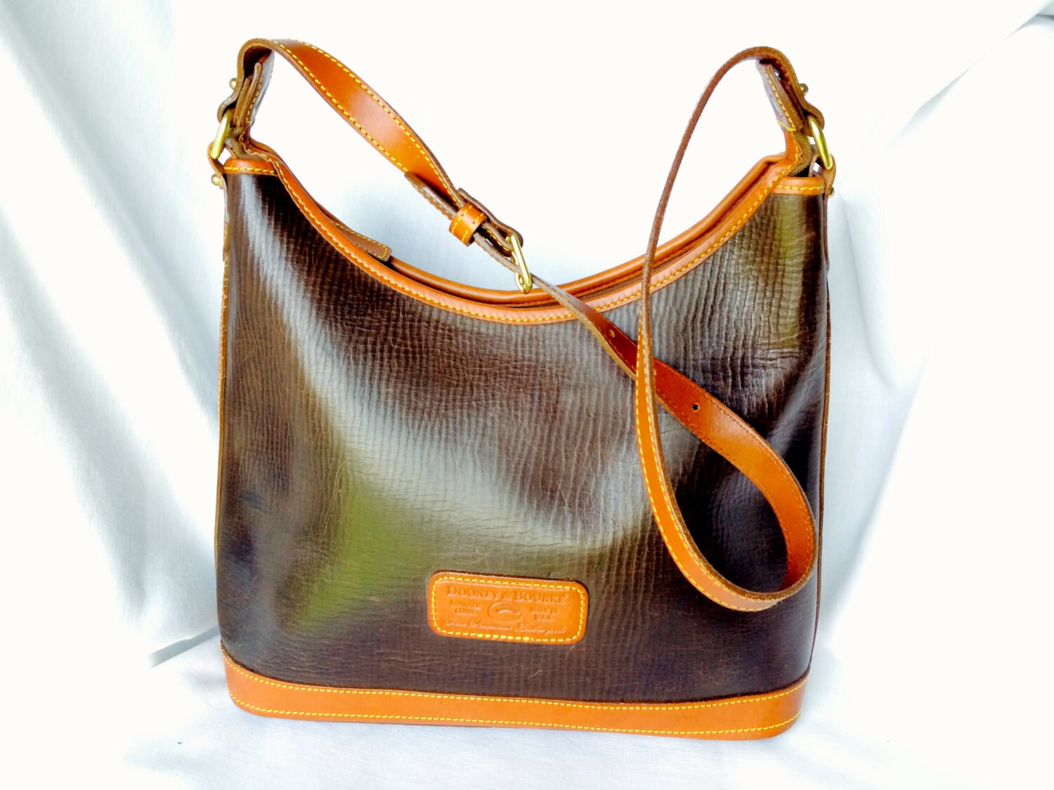 dooney and bourke plastic zipper
