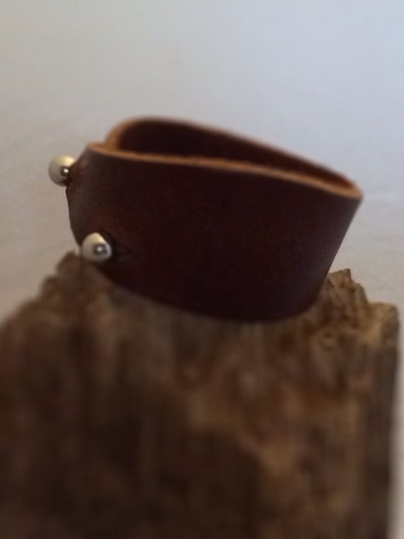 Items similar to Leather cuff with 2 large studs on Etsy