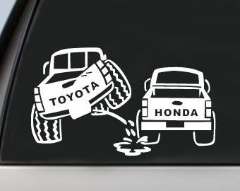pissing on toyota badge #2