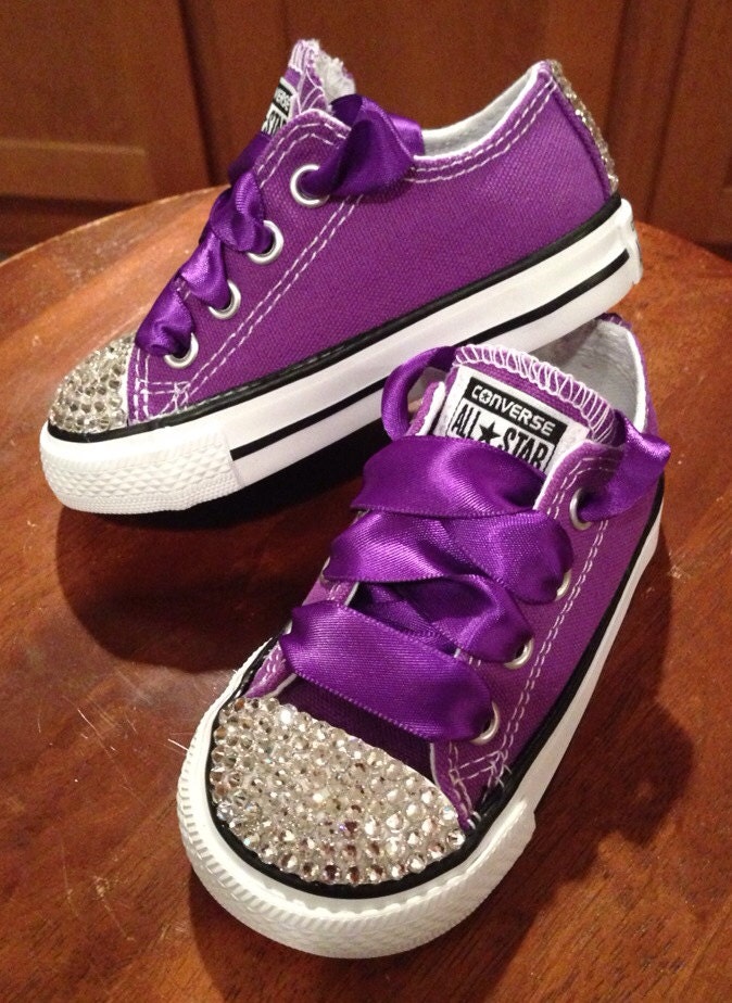 black shoes with purple laces