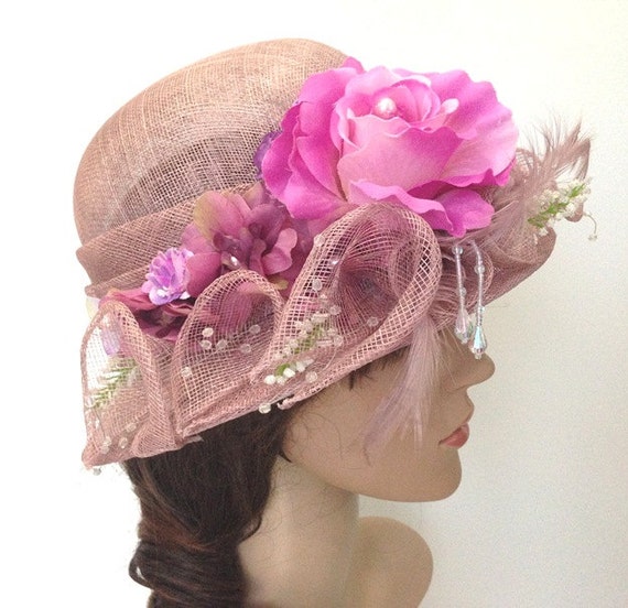 A Mauve Pink Sinamay Church Hat With Flowers And Feather