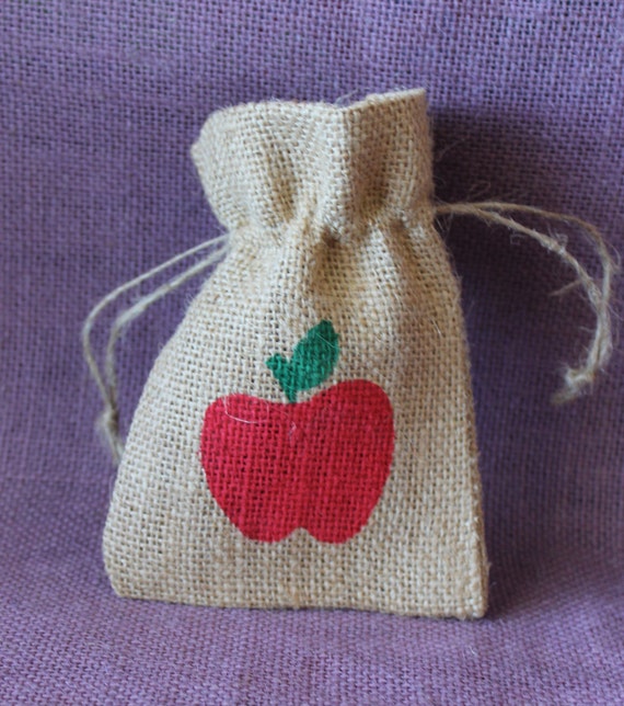 Small burlap bag with red apple design. Back to school party