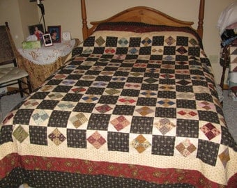 King size Quilt. This quilt pattern is called a square in a square. Looks great on a king size bed .