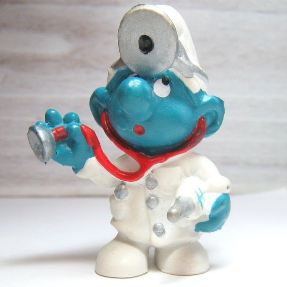 doctor smurf figurine