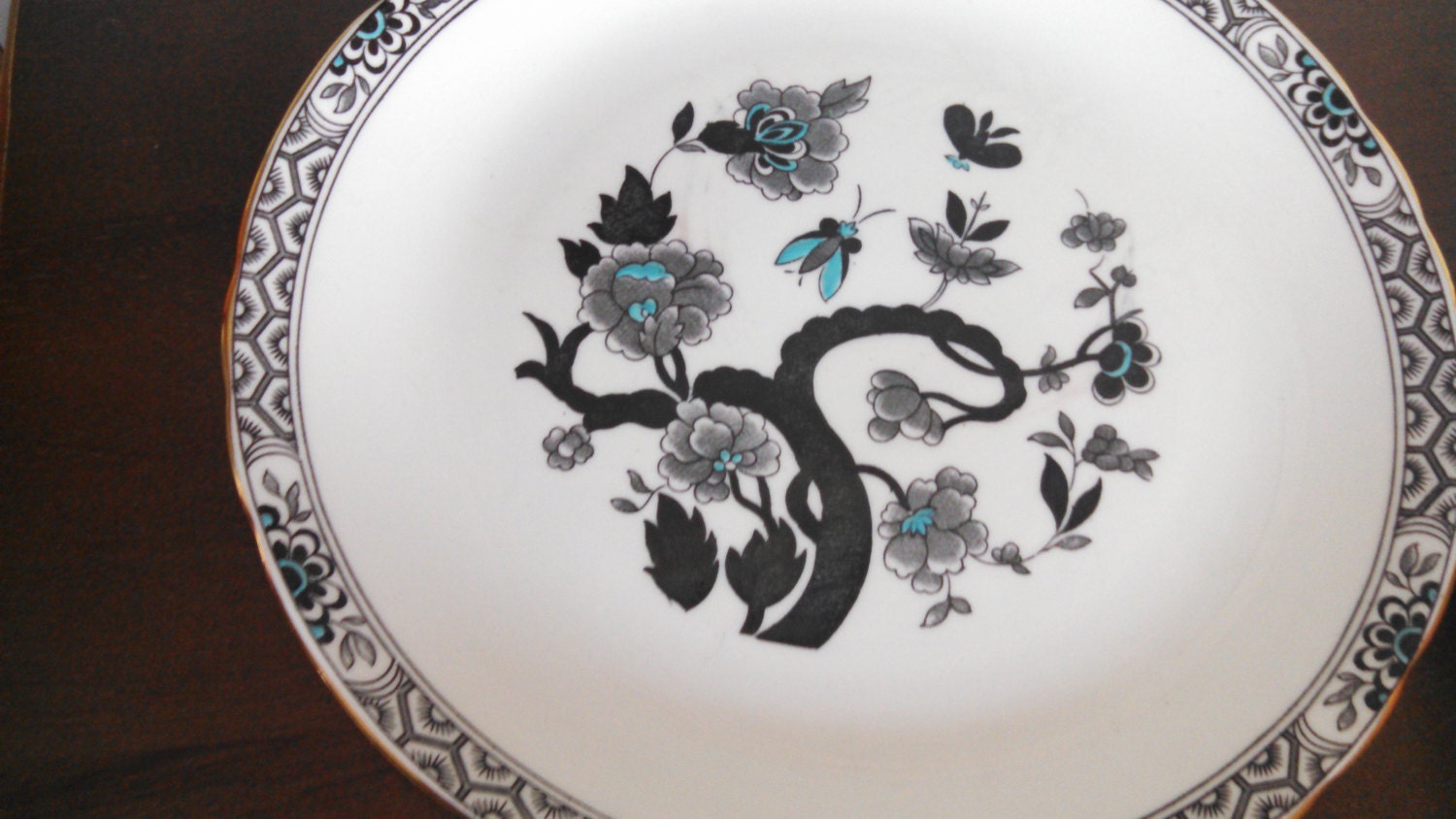 Tuscan Fine English Bone China plate blue and black floral