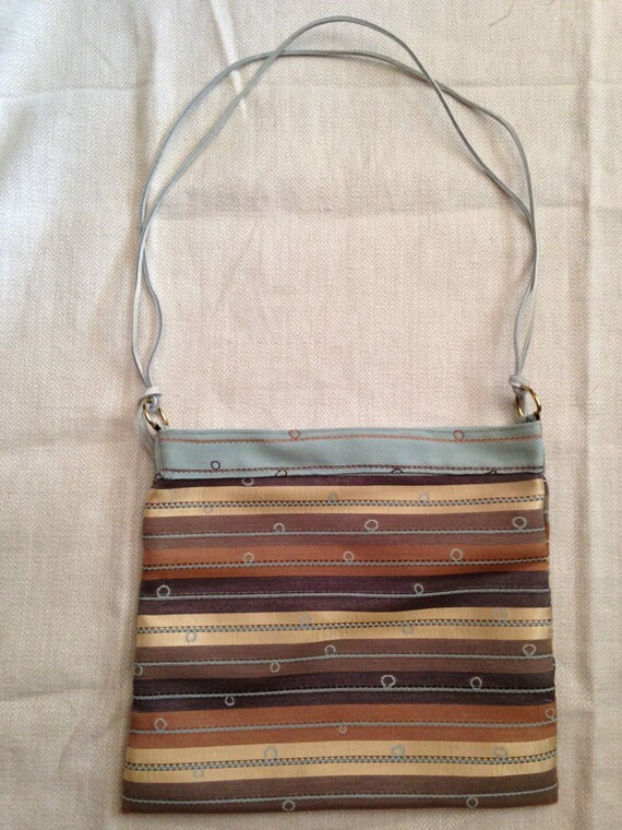 medium size purse with long strap