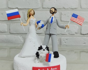 Custom wedding cake topper with their nations' flags