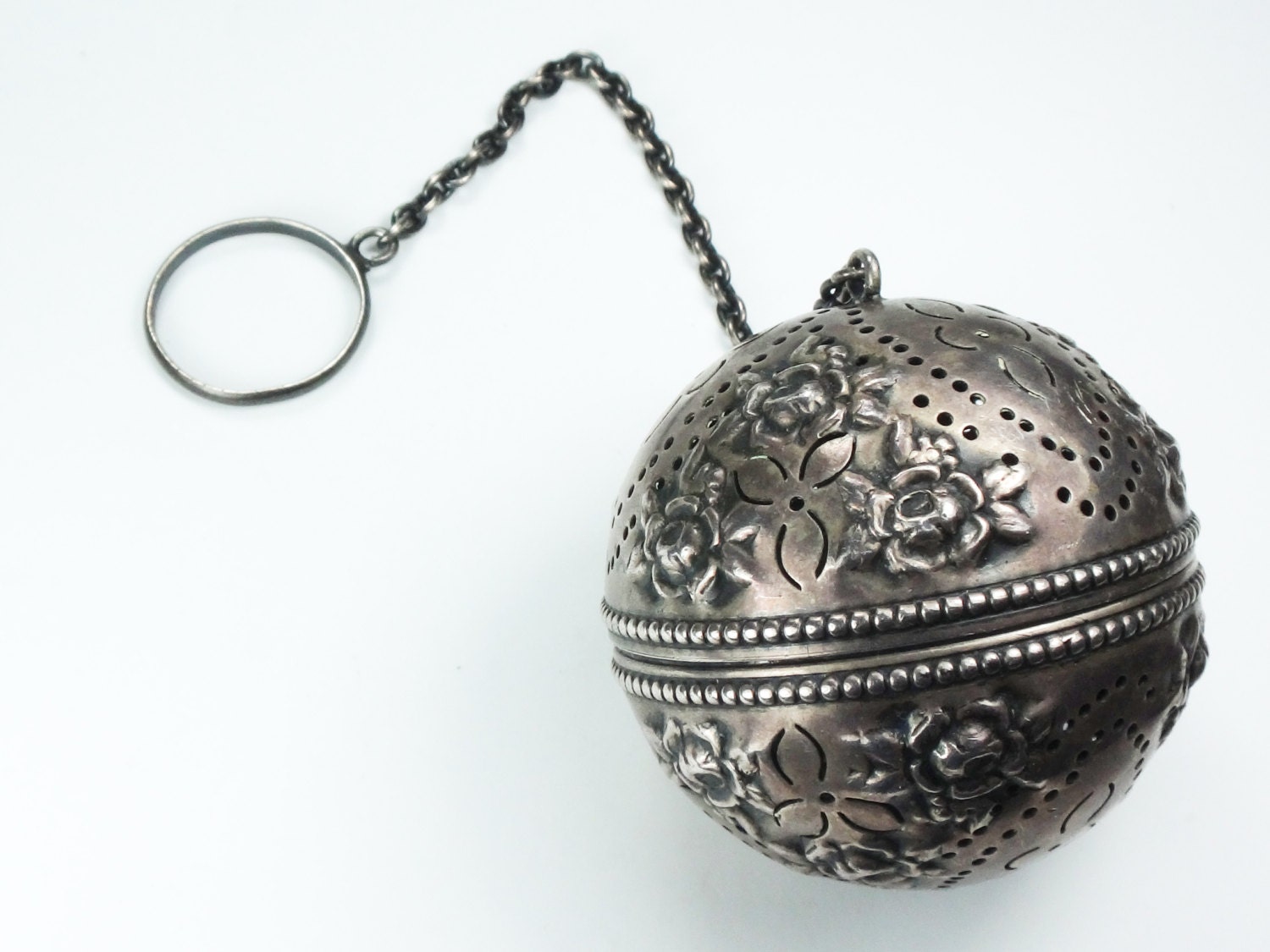 Perforated aluminum ball found at charity store r/whatisthisthing