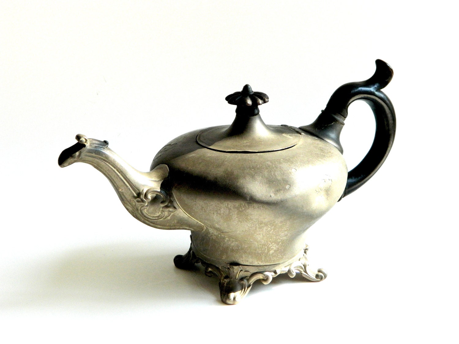 Antique metal teapot with wooden handle and knob country