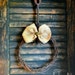 Barbed Wire Wreath with Burlap Bow