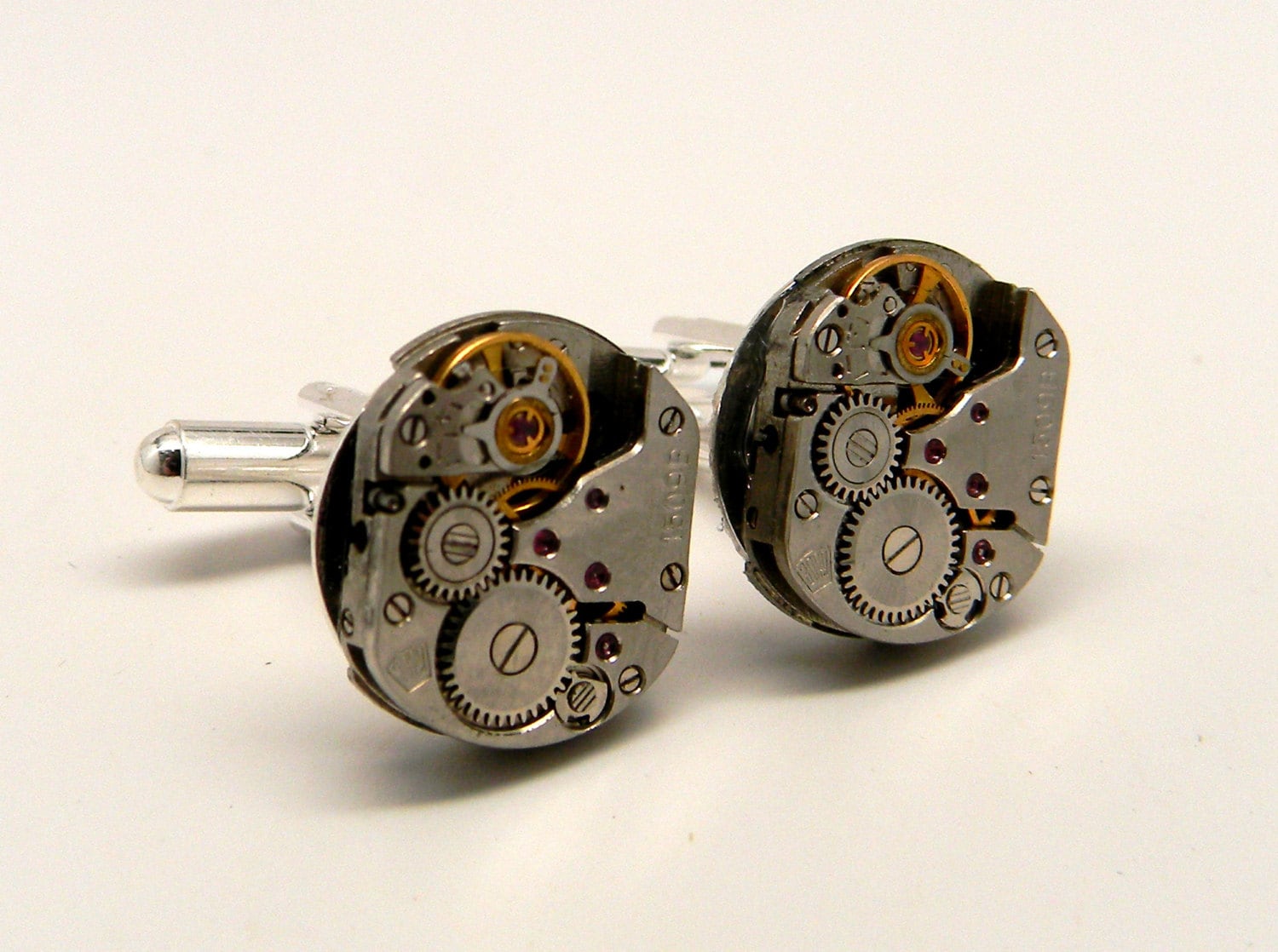 Steampunk cuff links with vintage watch movement. steampunk buy now online