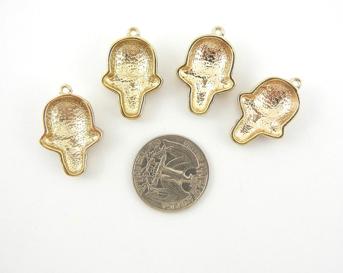 Set of 4 Antique Gold-tone Skull Head Charms