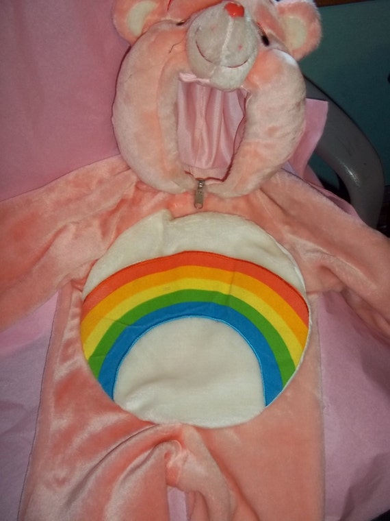 pink care bear with rainbow belly